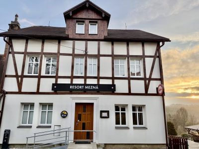 Building B – Nad Soutěskami in Resort Mezná at sunset, traditional half-timbered architecture of Bohemian Switzerland